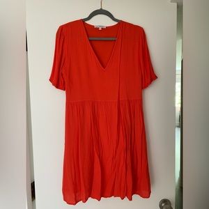 Coral dress size M. V neck. With inner lining. Very light fabric for warm days.